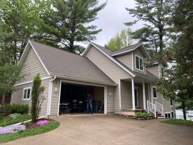 Asphalt Roof Replacement and Gutter Replacement in Waupaca, WI