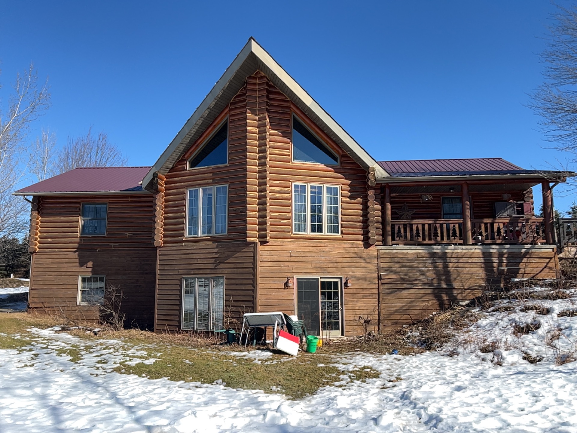 Everlast Advanced Composite Board & Batten Siding, and Versetta Accent Stone in Junction City, WI