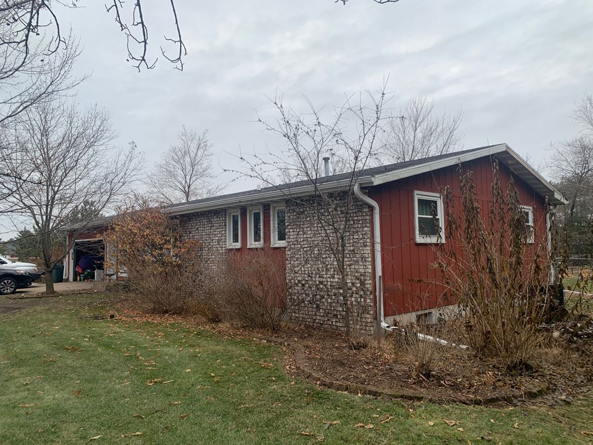Siding Replacement, Seamless Gutter Installation, and Garage Door Installation in Stevens Point, WI